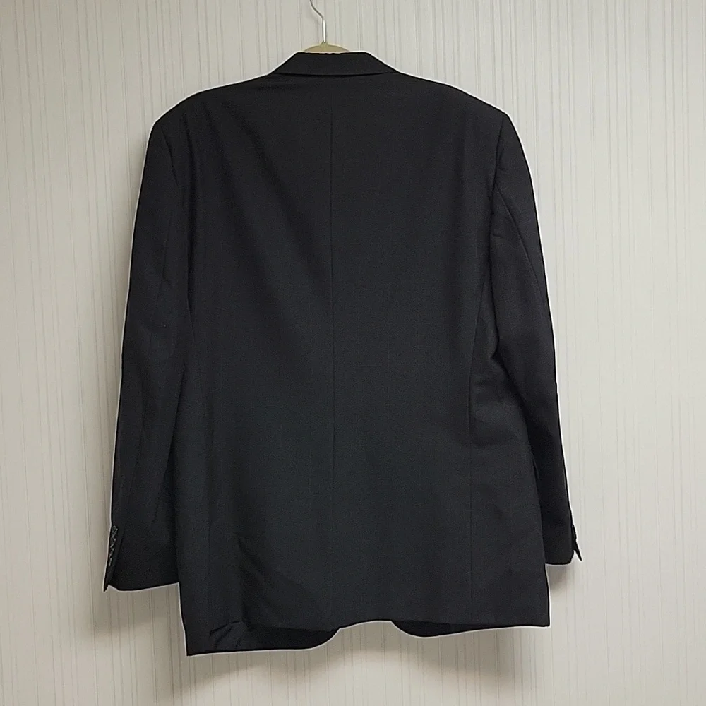 Burberrys vintage 1990s 100% pure wool black suit with tan plaid fabric. 46